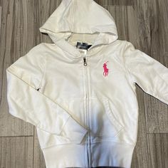 White With Pink Pony. Full Zip. White Fitted Cotton Sweatshirt, White Fitted Cotton Hoodie, Fitted White Cotton Hoodie, White Hoodie Top, Fitted White Hoodie Sweatshirt, White Fitted Hoodie Sweatshirt, White Fleece Top With Adjustable Hood, Ralph Lauren Cotton Winter Tops, White Fitted Hoodie