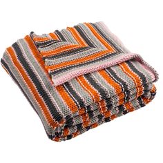 an orange and grey blanket folded on top of each other