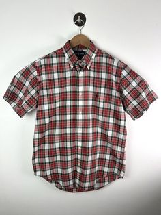 For sale is vintage 90s Polo Ralph Lauren Short sleeved check shirt 100% cotton Tagged size Small  Relaxed cut Measures 21.5'' Pit to pit across chest 30'' Length on back Good vintage condition, gently worn with no past signs of wear. Shipped safely and securely See my 100% positive feedback ! Classic Short Sleeve Summer Flannel Shirt, Classic Short Sleeve Flannel Shirt For Summer, Classic Short Sleeve Cotton Flannel Shirt, Plaid Short Sleeve Cotton Flannel Shirt, Classic Cotton Short Sleeve Flannel Shirt, Plaid Cotton Flannel Shirt With Short Sleeves, Classic Short Sleeve Plaid Top, Classic Cotton Short Sleeve Plaid Shirt, Classic Plaid Cotton Short Sleeve Shirt