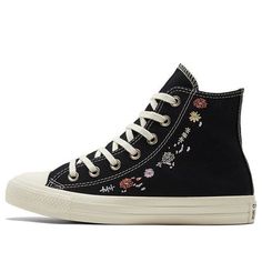 The Converse Chuck Taylor All Star High 'Embroidered Floral Black' is a timeless classic with an iconic silhouette. This sneaker is perfect for expressing your individual style and personality. The rubber sole provides comfort and durability, while the embroidered floral design adds a unique touch. This shoe is perfect for any activity, from everyday errands to nights out. The Chuck Taylor All Star series has been a symbol of self-expression and originality since 1917, connecting countless celebrities and icons to music, art, fashion and creativity. Show off your style with the Converse Chuck Taylor All Star High 'Embroidered Floral Black'. (SNKR/Women's/High Top/Embroidery) Converse Embroidery, Black Chucks, Embroidered Converse, Top Embroidery, Custom Converse, Xmas List, Black Converse, Cute Sneakers, Round Toe Heels