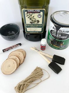 the supplies needed to make an art project include yarn, glue, and wood spoons