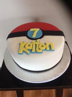 a birthday cake with the number seven on it