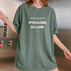 🔥🔥 IMPORTANT NOTICE: In case you come across this design elsewhere, please be aware that it has been taken without authorization from our store. This design has been created by me.🔥🔥 Enjoy our cozy retro inspired "Kingdom of Heaven New Jerusalem Praise Club" shirt. Great fall season loungewear or gift for friend, roommate or sibling in Christ, share the message of worship with this Christian sweatshirt THIS SHIRTCOMES IN: Moss, Ivory, Pepper, Black, Blossom, Expresso, Crimson COMORT COLORS T Church Merch Ideas, Church Merch, Black Blossom, Premium Aesthetic, Minimalist Shirts, Merch Ideas, Christian Tshirt, Fitted Shirts, Christian Sweatshirt