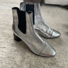 Worn Once Elegant Silver Heeled Boots For Fall, Silver Pointed Toe Heeled Boots For Fall, Silver Chic Heeled Boots For Formal Occasions, Chic Silver Heeled Boots For Formal Occasions, Chic Silver Heeled Boots For Formal Events, Chic Silver Heeled Boots With Round Toe, Metallic Leather Boots For Evening, Silver Boots For Formal Occasions In Fall, Silver Leather Heeled Boots For Formal Occasions