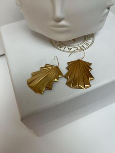 Lightweight fan /  leaf earrings hung on a gold ear wire  Leaf is gold brass; ear wire is 14K gold filled Complimentary gift wrap Please allow 1-2 days for processing Lead and nickel free Wire Leaf, Art Deco Fan, Fan Earrings, Gold Art Deco, Gold Art, Gold Brass, Free Gift Wrapping, Leaf Earrings, Ear Wire