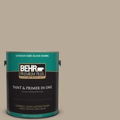 a white paint can with the words behr premium plus painted on it's side