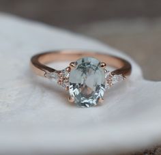 an oval cut aquamarinee and diamond ring