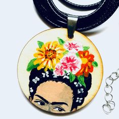 Floral Frida Pendant Necklace Hand Painted Wooden Floral Pendant Mexican Jewelry Girl Pendant Frida Artwear Wearable Art Frida Inspired Art Artistic Hand Painted Round Necklace, Hand Painted Round Jewelry For Festivals, Adjustable Hand Painted Necklace, Adjustable Hand Painted Round Necklace, Adjustable Hand Painted Necklaces, Adjustable Round Necklace With Artistic Design, Adjustable Round Hand Painted Necklaces, Round Adjustable Artistic Design Necklace, Hand Painted Multicolor Circular Jewelry