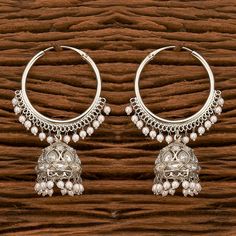 The striking look of this pair of earrings lets you captivate the beholders in a sophisticated way. Height = 65 mm || Width = 23 mm Classic Bali Antique Earring Handmade Design 100% Satisfaction Guarantee: Long Lasting Plating, High-Quality Stones. Gifting: This pair of charming earrings come in a beautiful gift box, making it an ideal gift for birthday, wedding anniversary or wedding gift. Occasion: Perfect choice for any Indian occasion. Care: It is advisable that you keep our products away fr Festival Chandbali Hoop Earrings, Bollywood Style Metal Hoop Earrings For Festivals, Festive Metal Chandbali Hoop Earrings, Wedding Chandbali Hoop Earrings, Silver Chandbali Bridal Earrings With Cutdana, Festive Bollywood Metal Hoop Earrings, Heavy Chandbali Metal Hoop Earrings, Traditional Silver Hoop Earrings For Party, Bollywood Style Silver Bridal Earrings With Cutdana