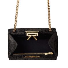 Handmade in New York, the Grace bag is crafted of black satin with a black and silver embroidery. Features a signature bow detail and gold hardware closure. Designer Black Clutch With Detachable Strap, Black Luxury Crossbody Evening Bag, Luxury Black Crossbody Evening Bag, Designer Evening Bags With Detachable Strap, Luxury Top Handle Shoulder Bag For Events, High-end Evening Clutch With Dust Bag, Luxury Top Handle Evening Bag For Events, Luxury Evening Bag With Top Handle For Events, Designer Black Evening Bag With Removable Pouch