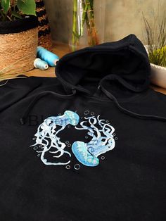 Hey, I'm happy to share my new project with you :)  Water Color Jellyfish Embroidered on Crewneck Sweatshirt, Hoodie Inspired by nature, organic elements and love.  Here's how to wash and take care of your next favorite sweatshirt/hoodie:  1. When to wash the sweatshirt ? I personally don't think that you need to wash it after every use. It needs to be washed after a few wears (five or six).  2. Which washing machine program should you use?  Turn the sweatshirt inside out and use the delicate or hand wash programs to respect the material. Unisex size for adults. Unisex size with variable sizes from XS to 3XL. Enjoy and contact me if you have any questions! Embroidered Art, Art Sea, Outfit Inspo Casual, Blue Pullover, Embroidered Sweatshirt, Embroidered Sweatshirts, Hoodie Design, Jellyfish, Diver