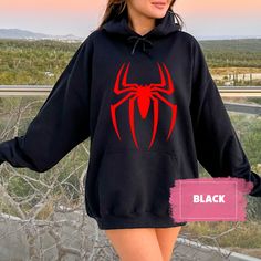 Trendy Sweatshirts Hoodie, Themed Black Top With Character Print, Themed Black Tops With Character Print, Themed Black Cotton Tops, Black Cotton Themed Tops, Superhero Black Tops For Streetwear, Black Screen Print Top For Cosplay, Black Screen Print Tops For Cosplay, Black Cotton Tops For Cosplay