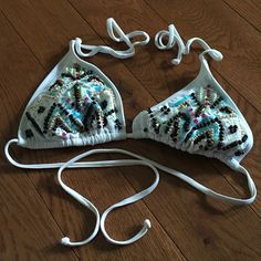 Nwot White Bikini Top With Beads & Sequin. Size Large. Noticed 2 Beads Missing On Inner Left Side Otherwise Everything Seems In Great Condition. Has Insert Pads Included. Never Worn & Need Room For Other Suits I Wear. Beaded Beachwear Swimwear For Festivals, Beaded Swimwear For Poolside And Beach Season, Beaded Swimwear With Triangle Top For Pool, Beaded Triangle Top Swimwear For Pool, White Beachwear Halter Top For Party, White Vacation Party Swimwear, Beaded Swimwear For Summer Pool Occasions, Embellished Swimwear For Summer Pool, Summer Beaded Swimwear For Pool