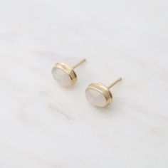 Oval White Moonstone Studs 14k yellow gold 5 x 7mm oval white moonstones 7 x 8.5mm total earring dimension Post ear wire Handmade in California by Monica Riley White Moonstone, Moon Stone, Ear Wire, Moonstone, Yellow Gold, California, Yellow, Gold, White