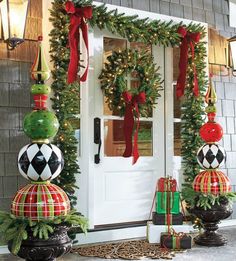 christmas decorations on the front door of a house