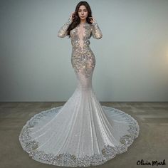 Olivia Mark - Exquisite Rhinestone-Embellished High Neck Long Sleeve Mesh Mermaid Maxi Evening Dress with a Glittering Touch Glamorous Rhinestone Mermaid Wedding Dress, Glamorous Floor-length Mermaid Dress With Rhinestones, Fitted Mermaid Dress With Rhinestones For Evening, Glamorous Embellished Mermaid Dress, Gala Mermaid Dress With Rhinestones, Mermaid Dress With Rhinestones For Gala, Rhinestone Mermaid Dress For Gala, Glamorous Embellished Fitted Mermaid Dress, Glamorous Embellished Floor-length Mermaid Dress