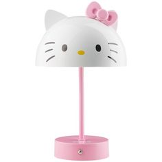 a hello kitty lamp with a pink base and a white cat's head on top