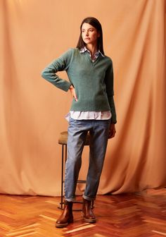 The Malibu sweater is knitted with wool for strength and soft texture. V-neck sweater. Green color. Knitted sweater. Regular Fit. 100% wool. The model is 1.76 cm and is wearing size M. Malibu Sweater, Soft Texture, Knitted Sweater, V Neck Sweater, Vneck Sweater, Green Color, Green Colors, Neck Sweater, Knitted Sweaters