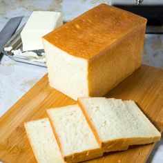 slices of bread sitting on top of a cutting board