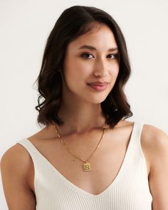 Timeless elegance combined with modern playfulness to create our gold Ancona necklace. Minimal yet detailed this necklace is the perfect layering piece you need in your summer wardrobe. Wear with the colourful Pompei Necklace or keep it classic with our Monti choker. 
Details

Handcrafted in a thick layer of 18k gold on sterling silverAdjustable chain length: 50 cm + 5 cm extenderPendant size: 1,8 cm x 1,6 cmChain width: 1,6 mmLuxurious cotton pouch & jewellery box with every order Modern Rectangular Clavicle Chain Necklace, Formal Necklace With Delicate Chain And Rectangular Pendant, Tarnish Resistant Necklace With Rectangular Pendant, Clavicle Chain Necklace With Rectangular Pendant, Formal Necklace With Square Pendant And Delicate Chain, Modern Necklace With Adjustable Chain And Rectangular Pendant, Modern Necklaces With Rectangular Pendant And Adjustable Chain, Modern Necklace With Rectangular Pendant And Adjustable Chain, Modern Necklace With Square Pendant And Delicate Chain