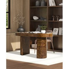 a wooden table sitting in the middle of a room next to a bookshelf