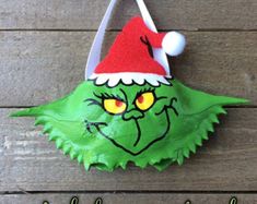 the grin face has been made into an ornament for this decoration, and it is