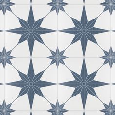 a blue and white tile pattern with stars