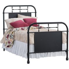 a black metal bed frame with red pillows and blankets on the headboard, in front of a white background