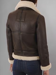 Step into classic aviator style with the Aviator Women's Distressed Brown Jacket. Crafted from high-quality distressed brown leather, this jacket exudes rugged elegance and timeless charm. Inspired by vintage aviator jackets, this piece features all the iconic elements that make the style so enduring. From the oversized lapels and asymmetrical zipper to the cozy shearling lining, every detail is designed to evoke the spirit of adventure and exploration. The distressed finish adds a touch of authenticity and character, giving the jacket a lived-in look that only gets better with age. Whether you're flying high or exploring the urban jungle, this jacket will be your trusty companion on any journey. The versatile brown hue pairs effortlessly with a wide range of outfits, from casual jeans and Rugged Brown Outerwear With Padded Collar, Classic Brown Aviator Outerwear, Classic Brown Aviator Style Outerwear, Rugged Brown Leather Jacket With Padded Collar, Classic Aviator Biker Jacket For Fall, Classic Aviator Outerwear For Fall, Classic Aviator-style Outerwear For Fall, Classic Brown Leather Jacket With Padded Collar, Rugged Brown Shearling Leather Jacket