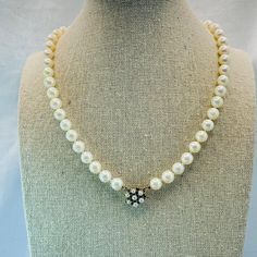 49 Round Cultured Pearls on a knotted silk strand with 14k white gold pearl box clasp. The pearls are approximately 7.3- 7.45mm round. white/ cream color with excellent luster, and very slight to no blistering. very well matched strand Vintage, like new condition 2500.00 retail, will send certified appraisal upon completion of sale, upon request  Weighs 32.75 grams  See all pictures for details and measurements All of my jewelry comes packaged nicely for gift giving! Please visit my store / page to see my extensive inventory of fine, handmade, vintage to now and antique jewelry, all carefully tested and inspected Features: * vintage pearl strand, 14k white gold clasp, cultured pearls Size: Womens 17 inches Condition: Pre-Owned Like New Excellent Condition! NO Heavy Scratches, Dents, or Din Formal Single Strand Pearl Necklace, Formal Pearl Necklace With Round Beads, Pearl Necklace For Anniversary, Classic White Pearl Necklace, Formal White Gold Pearl Necklace With Sterling Silver Clasp, Anniversary Pearl Embellished Round Necklace, Formal Single Strand Pearl Necklace In White Gold, Formal White Gold Single Strand Pearl Necklace, Formal Single Strand White Gold Pearl Necklace