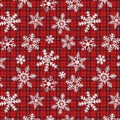 red and white snowflakes are on a plaid fabric seamless pattern stock photo