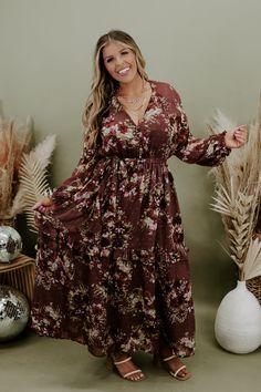 Our Midnight Enchantment Maxi Dress has long whimsical sleeves, stunning multi colored boho designs, lined skirt, and a flirty floucy hem. Style this piece with your favorite accessories and you are going to make an everlasting impression! Neckline: v- neckline with swoop detail Fabric: 97% polyester, 3% Lurex Details: Floucy hem, lined skirt, tiered skirt, boho floral pattern, and long whimsical sleeves 100% Polyester Fit: Oversized; maxi fit Model Specs: Karli is wearing the small in photos. ( Fall Bohemian Flowy Boho Dress, Flowy Bohemian Boho Dress For Fall, Long Sleeve Brown Bohemian Boho Dress, Flowy Long Sleeve Boho Party Dress, Fall Bohemian Boho Dress With Floral Print, Bohemian Maxi Dress With Ruffle Hem For Party, Fall Bohemian Floral Print Boho Dress, Fall Bohemian Floral Print Dress, Fall Floral Bohemian Boho Dress