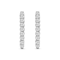 Achieve a most sophisticated look with these diamond oval-shaped hoop earrings. 10K white gold Each oval-shaped hoop features 1/20 ct. diamonds sparkling along the front edge 1 ct. t.w. of diamonds Hinged backs Oval Diamond White Hoop Earrings Fine Jewelry, Diamond White Oval Hoop Earrings With Prong Setting, White Gold Diamond Hoop Earrings With Oval Shape, Oval Diamond Hoop Earrings In White Gold, White Gold Oval Diamond Hoop Earrings, Oval Hoop Earrings In Diamond White With Brilliant Cut, Classic Oval Cubic Zirconia Hoop Earrings, Diamond White Oval Hoop Earrings For Formal Occasions, Formal Oval Hoop Earrings With Prong Setting