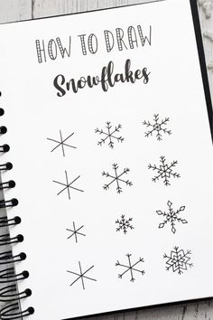 a notebook with snowflakes drawn on it and the title how to draw snowflakes