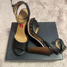 Never Worn Size 9 They Are 5 Inch Heels Only Thing Is The Buckle Of The Heels The Leather Part Is Peeling But Nothing Major Tommy Hilfiger Leather Sandals With Round Toe, Black Synthetic Sandals By Tommy Hilfiger, Tommy Hilfiger Black Open Toe Sandals, Tommy Hilfiger Leather Heels With Round Toe, Tommy Hilfiger Heels, Hilfiger Shoes, Tommy Hilfiger Shoes, 5 Inch Heels, Shoes Black