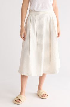 Soft stripes enliven this lightweight skirt designed in a flared silhouette. 30" length Side-seam pockets 76% rayon, 21% nylon, 3% spandex Machine wash, line dry Made in the USA of imported fabric Beige Midi Maxi Skirt, Beige Flowy Maxi Skirt Midi Length, Beige Lined Skirt For Spring, Cotton A-line Bottoms For Day Out, Beige Flowy Midi-length Pleated Skirt, Beige Flowy Midi-length Skirt, Beige Lined Maxi Skirt For Day Out, Flowy Beige Pleated Midi Skirt, Spring Beige Voluminous Skirt