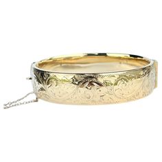 This gorgeous metal core bangle has wonderful engraving and is coated in 9ct gold. Inner diameter widest point: 6.1cm Inner circumference: 17.2cm Bangle Width: 16mm Weight: 31g Luxury Antique Etched Bangle, Engraved Bangle, Metal Core, Yellow Gold Engagement Rings, Antique Metal, Mid Century Modern Furniture, Gold Engagement, Le Point, Modern Furniture