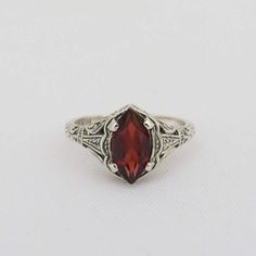 Vintage Sterling Silver Natural Garnet Filigree Ring ....Marked 925...Total of weights 2.0grams..Size 6...Measure of Face 9.9MM...It's in very good condition. Antique Rings Silver, Silver Red Ring, Formal Silver Engraved Ring With Birthstone, Ruby Wedding Rings Silver, Formal Sterling Silver Birthstone Engraved Ring, Formal Sterling Silver Engraved Ring With Birthstone, Vintage Style Engagement Rings Silver, Classic Sterling Silver Engraved Ring With Gemstone, Victorian Sterling Silver Ring For Formal Occasions