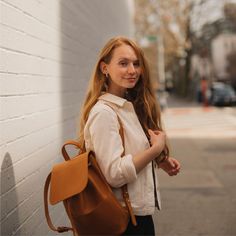 Crafted from premium full-grain leather, the Abby Backpack showcases the exquisite texture and durability that only high-quality leather can provide. Its rich, supple feel and natural variations make each piece unique. Designed for versatility and style, it features an interior pocket for organized storage, a D-ring for keys and clips, and a secure drawstring and magnet closure. Perfect for urban adventures, nature exploration, and everything in between, the Abby effortlessly combines the portab Nature Exploration, Premium Luggage, Urban Backpack, Organized Storage, Sustainable Leather, Woven Handbags, Leather Travel Bag, Best Wallet, Soccer Balls