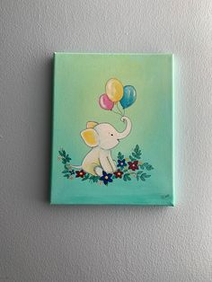 an elephant with balloons is painted on a canvas wall hanging in the corner of a room