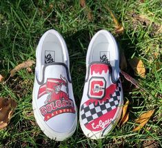 COLLEGE THEMED VANS!  Please specify what college you would like to be painted on the shoes. In addition, we can do designs for sports teams/events/personal brands logos - please message to request! - Our current processing time is 1-4 weeks, but please message me if you need the shoes by a certain date. The best things are worth the wait.  - Acrylic Waterproof paint.  - 100 % Authentic products purchased from the original retailer  - Made in the US. - The sizes are unisex so please don't panic if, for example, you order a 6.5 M and receive an 8 W, THEY ARE EXACTLY THE SAME SHOES and will fit the same. Please refer to the Size Guide. - NO RETURNS. Custom shoes are made to order. If you have any inquiries about your order, please send us an email and we will happy to assist you. Sporty Low-top Sneakers For College, Sporty White Sneakers With Custom Artwork, White Team Spirit Sneakers With Team Name, White Sneakers With Team Spirit, Sporty Custom Sneakers With Artwork, Custom Vans Shoes, Painted Canvas Shoes, Nike Air Force 1 Custom, Waterproof Paint