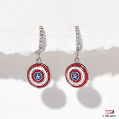 With our Marvel's Captain America Hoops, you can add some Super Hero style to your everyday look. The hoops feature Captain America's iconic shield, with vibrant red, white, and blue enamel detailing that's sure to make a statement. The glimmering stones that line the hoops add an extra level of chicness, making these earrings a true standout. Marvel Earrings, Panther Earrings, Avengers Icon, Marvel Jewelry, Shop Disney, Wakanda Forever, Marvel Captain America, Necklace Chain Lengths, Marvel X