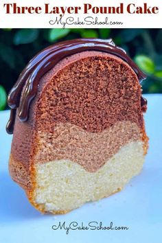 there is a piece of cake with chocolate icing on it and the words, three layer pound cake