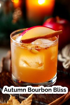 the autumn bourbon bliss cocktail is garnished with an apple