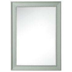 a white framed mirror with beading on the edges and an ornate border around it