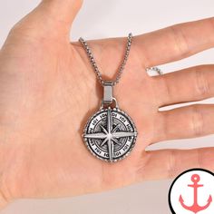 Enhance your style with the Stylish Men's Compass Necklace Are you a passionate lover of the sea and its various symbols? Here at Made in Sea, we offer a wide range of nautical jewelry and accessories that are perfect for those who share a deep connection to the ocean. Our Compass Necklace collection features intricately crafted pieces that embody the spirit of the sea, and our Stylish Men's Compass Necklace is no exception. Features of the Stylish Men's Compass Necklace High-quality craftsmansh Black Stainless Steel Medallion Necklaces, Black Medallion Stainless Steel Necklaces, Black Stainless Steel Medallion Necklace, Durable Metal Necklace As Gift, Durable Metal Necklaces As A Gift, Durable Metal Necklaces For Gifts, Durable Metal Necklace Gift, Nautical Style Metal Jewelry Gift, Durable Symbolic Jewelry As A Gift