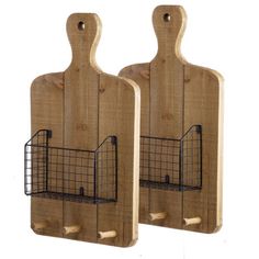 two wooden cutting boards with wire baskets attached to the handles on each one, both made out of wood