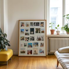 a living room filled with lots of pictures on the wall next to a chair and window