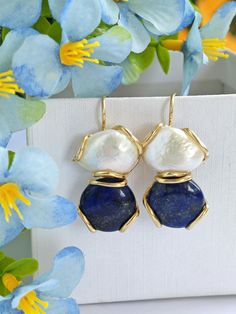 Classic earrings with white baroque pearls and blue lapis lazuli hard stones, set with gold-plated 925 silver. Hook closure. Total length 4.3 cm. Elegant Blue Pearl Earrings With Natural Stones, Elegant Lapis Lazuli Earrings With Natural Stones, Blue Lapis Lazuli, Classic Earrings, Italian Jewelry, Blue Lapis, 925 Silver Earrings, Baroque Pearls, Lapis Lazuli