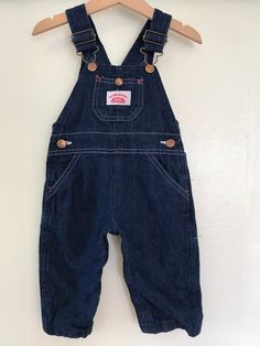 These are in flawless vintage condition and would make an epic baby shower gift. They are made in USA in the 70's by Roundhouse and are tagged an 18 months. Measurements are provided in the photos for an accurate fit. (10) Vintage Bib Front Denim Jumpsuit In Medium Wash, Vintage Medium Wash Denim Jumpsuit With Bib Front, Vintage Cotton Denim Jumpsuit, Vintage Denim Blue Bib Front Jeans, Vintage Denim Shortalls With Bib Front, Vintage Dark Wash Cotton Denim Jumpsuit, Vintage Denim Blue Cotton Jumpsuit, Vintage Medium Wash Overalls, Blue Fitted Vintage Overalls